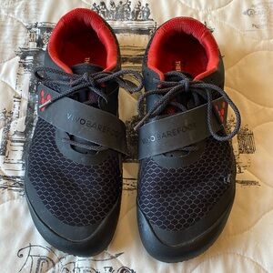 Vivobarefoot Motus I. Very gently used.  Thermal insert included.